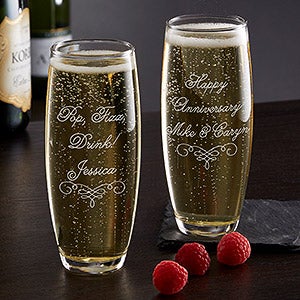 writing on champagne glasses